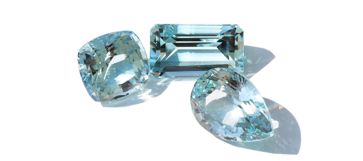 loose natural blue topaz gemstones in different cuts
